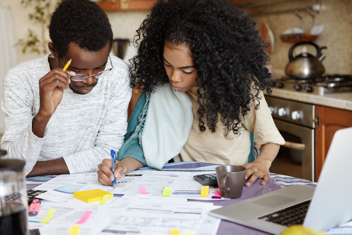 A man and a woman doing due diligence on a property before buying